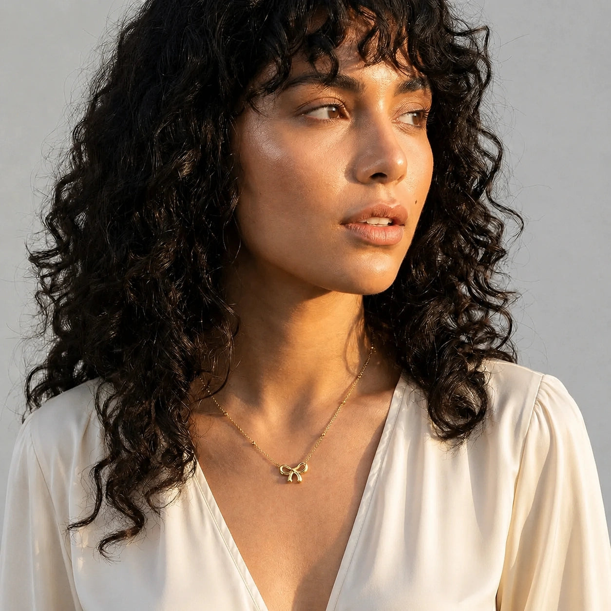 Golden Bow Charm Necklace