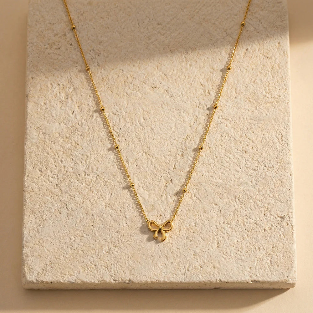 Golden Bow Charm Necklace
