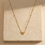 Golden Bow Charm Necklace
